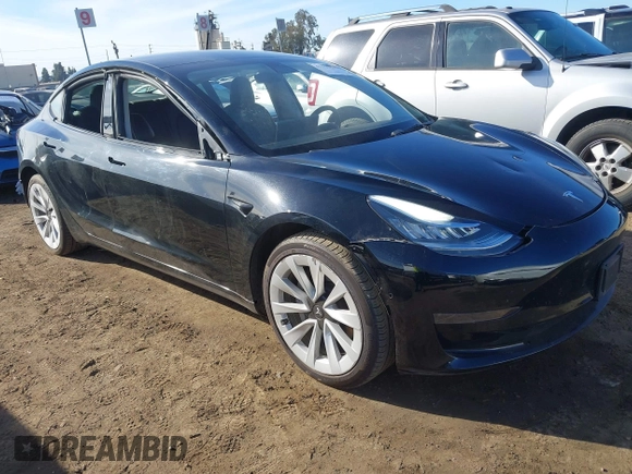 2022 Tesla Model 3 with VIN 5YJ3E1EA9NF295890, listed as a IAAI auction lot 41175917 with 42,230 mi miles and . Bid and sale history available at DreamBid. Image 1.