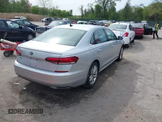 2020 Volkswagen Passat SE with VIN 1VWSA7A31LC027280, listed as a IAAI auction lot 42118675 with 72,165 mi miles and . Bid and sale history available at DreamBid. Image 4.
