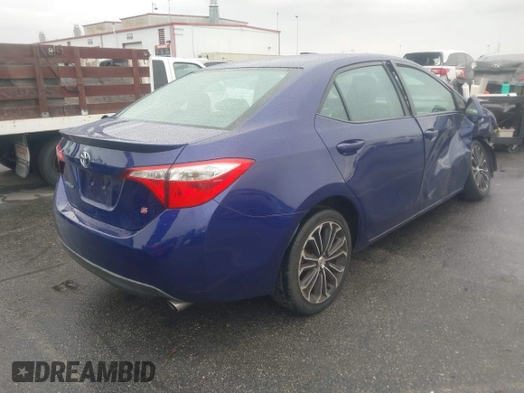 2014 Toyota Corolla L with VIN 5YFBURHE8EP173523, listed as a IAAI auction lot 41802729 with 77,336 mi miles and . Bid and sale history available at DreamBid. Image 4.