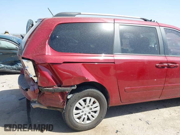 2012 Kia Sedona LX with VIN KNDMG4C70C6463190, listed as a IAAI auction lot 41781336 with 179,860 mi miles. Bid and sale history available at carsss.com. Image 6.