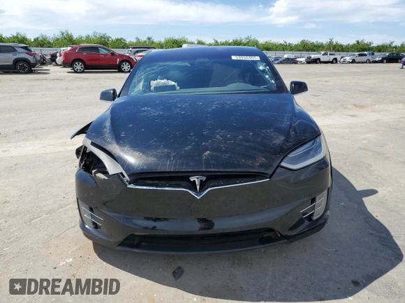 2016 Tesla Model X 70D z VIN 5YJXCDE23GF018396, wystawiony jako Copart lot #53056465 z przebiegiem 104 248 mil mil oraz Szkody całkowita. Historia ofert i sprzedaży dostępna na DreamBid. Obrazek 5.