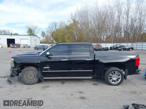 2016 Chevrolet Silverado 1500 High Country with VIN 3GCUKTEC2GG344953, listed as a IAAI auction lot 40700121 with 107,623 mi miles and . Bid and sale history available at DreamBid. Image 14.
