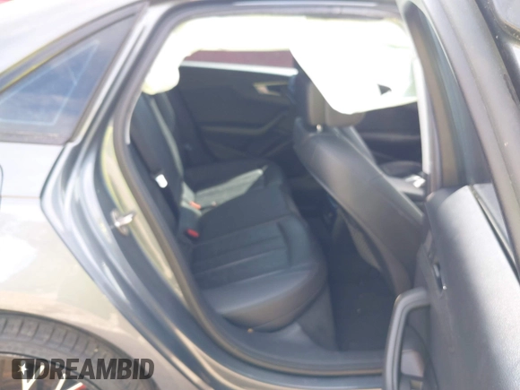 2017 Audi A4 Premium z VIN WAUGNAF42HA025565, wystawiony jako IAAI lot #38943168 z przebiegiem 103 953 mil mil oraz . Historia ofert i sprzedaży dostępna na DreamBid. Obrazek 8.