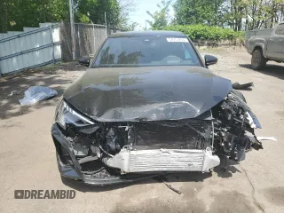2024 Audi RS 3 z VIN WUAG4DGY5RA900327, wystawiony jako Copart lot #54953264 z przebiegiem Nie podano mil oraz Szkody całkowita. Historia ofert i sprzedaży dostępna na DreamBid. Obrazek 5.