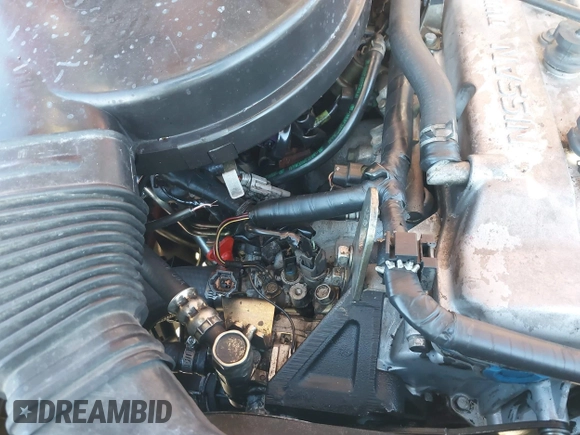 2004 Nissan Frontier XE with VIN 1N6DD26T54C417487, listed as a IAAI auction lot 41838384 with 284,963 mi miles and . Bid and sale history available at DreamBid. Image 12.
