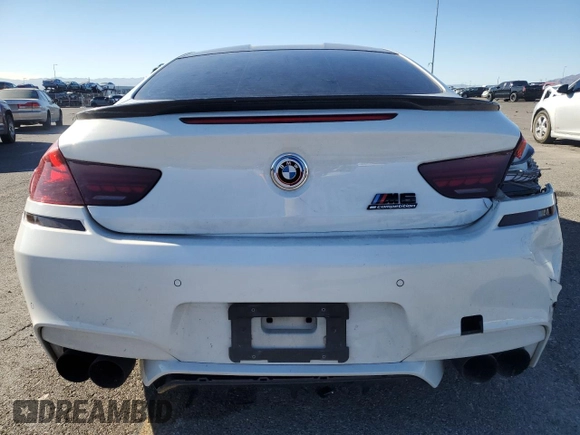 2015 BMW M6 z VIN WBSLX9C54FD160753, wystawiony jako Copart lot #83486484 z przebiegiem 80 275 mil mil oraz Szkody całkowita. Historia ofert i sprzedaży dostępna na DreamBid. Obrazek 6.
