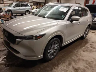 2024 Mazda CX-5 2.5 S Premium Package with VIN JM3KFBDL2R0431998, listed as a IAAI auction lot 41690216 with 14,037 mi miles. Bid and sale history available at carsss.com. Image 22.