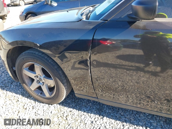 2007 Dodge Charger with VIN 2B3KA43R97H843225, listed as a IAAI auction lot 41098869 with 150,424 mi miles and . Bid and sale history available at DreamBid. Image 12.