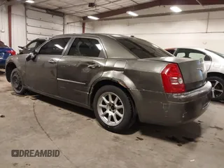 2010 Chrysler 300 Touring with VIN 2C3CA5CV9AH213299, listed as a IAAI auction lot 41754215 with 172,467 mi miles. Bid and sale history available at carsss.com. Image 3.