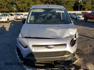 2014 Ford Transit Connect XLT с VIN NM0AE8F7XE1149510, выставлен на аукционе Copart как лот 82015004 с пробегом 75 499 миль миль и Списание • Salvage title. История ставок и продаж доступна на DreamBid. Изображение 5.
