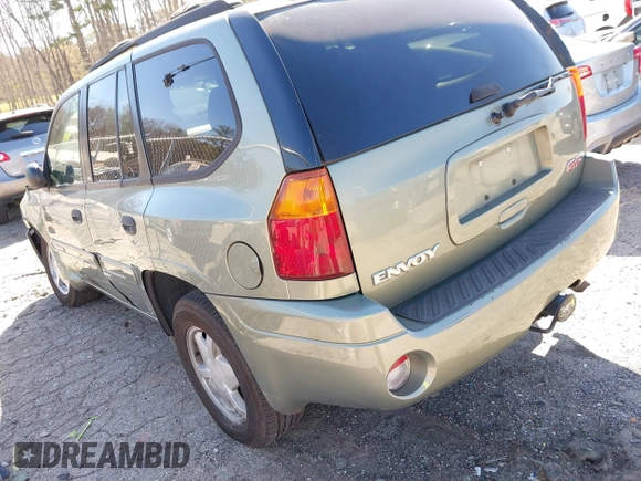 2003 GMC Envoy SLT with VIN 1GKDS13S432373988, listed as a IAAI auction lot 41840744 with 221,306 mi miles. Bid and sale history available at carsss.com. Image 3.
