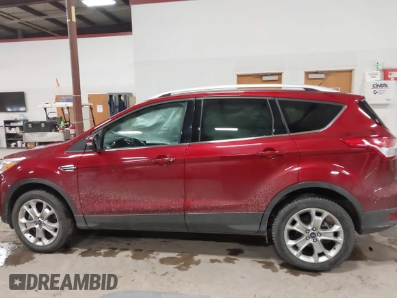 2014 Ford Escape Titanium with VIN 1FMCU9J9XEUA51732, listed as a IAAI auction lot 41542867 with 44,141 mi miles. Bid and sale history available at carsss.com. Image 14.