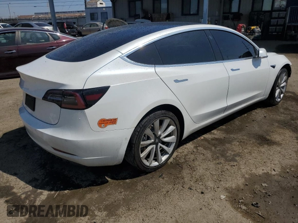 2019 Tesla Model 3 Mid Range with VIN 5YJ3E1EA0KF466585, listed as a Copart auction lot 50313695 with 70,703 mi miles and Salvage Title. Bid and sale history available at carsss.com. Image 3.