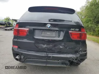 2012 BMW X5 35d with VIN 5UXZW0C54CL671377, listed as a Copart auction lot 60936395 with 105,903 mi miles and Salvage title. Bid and sale history available at DreamBid. Image 6.