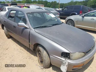 1996 Toyota Camry DX with VIN 4T1BG12K4TU689073, listed as a IAAI auction lot 42410010 with 234,494 mi miles and . Bid and sale history available at DreamBid. Image 1.