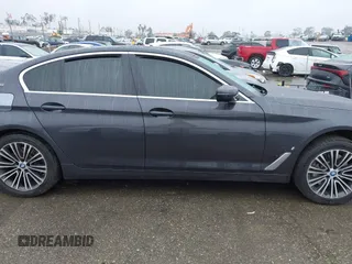 2019 BMW 5 Series 530e iPerformance with VIN WBAJA9C53KB399794, listed as a IAAI auction lot 41561874 with Not Provided miles. Bid and sale history available at carsss.com. Image 13.