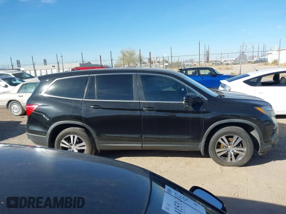 2017 Honda Pilot EX-L with VIN 5FNYF6H54HB063619, listed as a IAAI auction lot 41545415 with Not Provided miles and . Bid and sale history available at DreamBid. Image 12.
