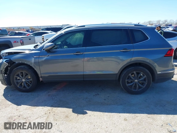 2023 Volkswagen Tiguan SE with VIN 3VV3B7AX5PM142378, listed as a IAAI auction lot 41835204 with 13,670 mi miles and . Bid and sale history available at DreamBid. Image 14.