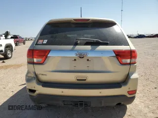 2012 Jeep Grand Cherokee Laredo with VIN 1C4RJEAG7CC125383, listed as a Copart auction lot 51180845 with 0 mi miles and Salvage Title. Bid and sale history available at carsss.com. Image 6.
