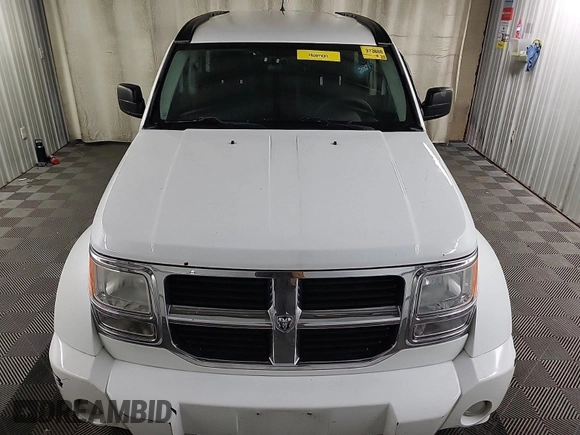 2011 Dodge Nitro SE z VIN 1D4PT2GK2BW589063, wystawiony jako IAAI lot #42408917 z przebiegiem 160 504 mil mil oraz . Historia ofert i sprzedaży dostępna na DreamBid. Obrazek 3.