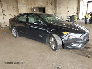 2017 Ford Fusion Titanium z VIN 3FA6P0SU3HR268788, wystawiony jako IAAI lot #42413877 z przebiegiem 193 561 mil mil oraz . Historia ofert i sprzedaży dostępna na DreamBid. Obrazek 1.