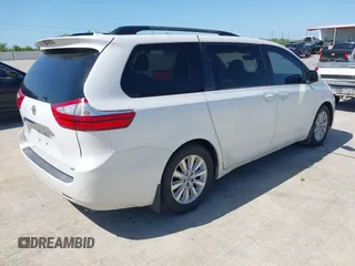 2015 Toyota Sienna XLE with VIN 5TDYK3DC8FS666113, listed as a IAAI auction lot 41999037 with 179,566 mi miles and . Bid and sale history available at carsss.com. Image 4.