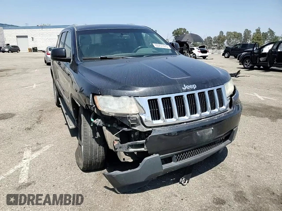 2011 Jeep Grand Cherokee Laredo with VIN 1J4RR4GG0BC563603, listed as a Copart auction lot 60237475 with 243,885 mi miles and Salvage title. Bid and sale history available at DreamBid. Image 14.