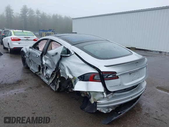 2014 Tesla Model S 60 with VIN 5YJSA1H18EFP30143, listed as a IAAI auction lot 42190505 with Not provided miles and . Bid and sale history available at DreamBid. Image 3.