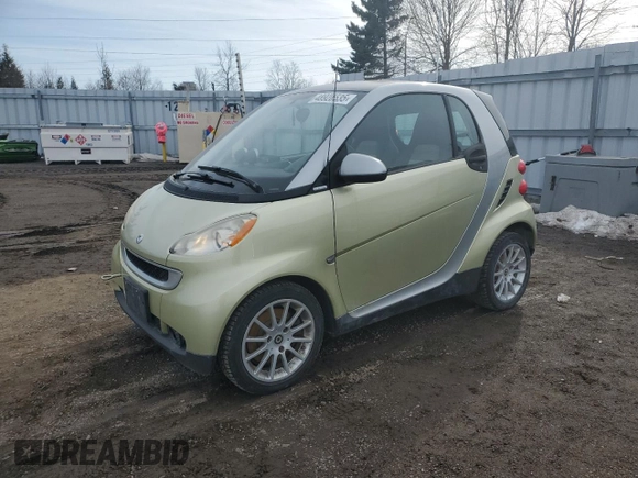 2009 Smart fortwo Pure z VIN WMEEJ31X49K292142, wystawiony jako Copart lot #48928535 z przebiegiem 226 263 mil mil oraz Tytuł czysty. Historia ofert i sprzedaży dostępna na DreamBid. Obrazek 1.