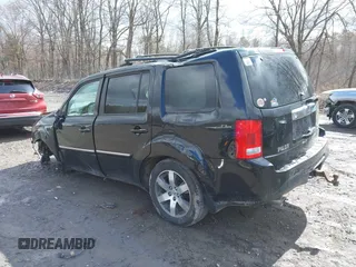 2012 Honda Pilot Touring with VIN 5FNYF4H93CB071923, listed as a IAAI auction lot 41946074 with 175,663 mi miles and . Bid and sale history available at carsss.com. Image 3.