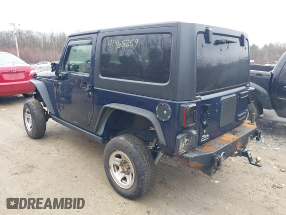 2013 Jeep Wrangler Rubicon 10th Anniversary with VIN 1C4BJWCG7DL544145, listed as a IAAI auction lot 41965259 with 125,900 mi miles and . Bid and sale history available at carsss.com. Image 3.