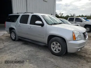 2014 GMC Yukon XL SLT with VIN 1GKS1KE03ER234487, listed as a Copart auction lot 74897284 with 198,965 mi miles and Salvage Title. Bid and sale history available at carsss.com. Image 4.