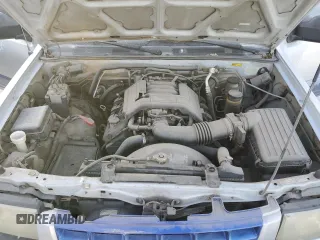 1999 Isuzu Rodeo S with VIN 4S2CK58W2X4361475, listed as a Copart auction lot 63873864 with 232,406 mi miles and Salvage Title. Bid and sale history available at DreamBid. Image 11.