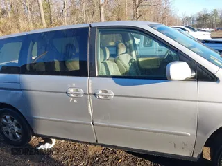 2002 Honda Odyssey EX z VIN 2HKRL18652H566576, wystawiony jako IAAI lot #40974704 z przebiegiem 232 172 mil mil oraz . Historia ofert i sprzedaży dostępna na DreamBid. Obrazek 13.