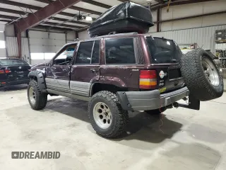 1996 Jeep Grand Cherokee Laredo with VIN 1J4GZ58Y1TC171915, listed as a Copart auction lot 50764034 with 0 mi miles and Salvage Title. Bid and sale history available at carsss.com. Image 2.