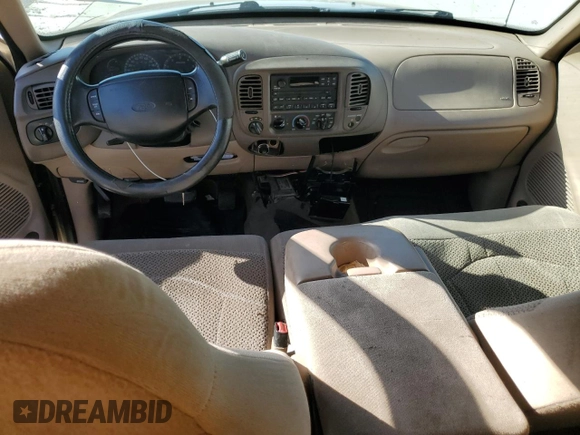 1999 Ford F-150 XL with VIN 1FTRX18L5XKA44484, listed as a Copart auction lot 56232815 with 177,990 mi miles and Salvage title. Bid and sale history available at DreamBid. Image 8.