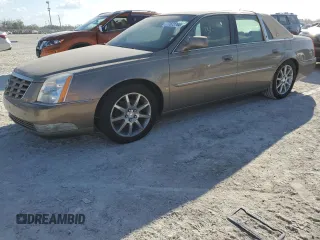 2006 Cadillac DTS 1SE with VIN 1G6KD57996U133097, listed as a Copart auction lot 77673764 with Not Provided miles and Salvage Title. Bid and sale history available at DreamBid. Image 1.