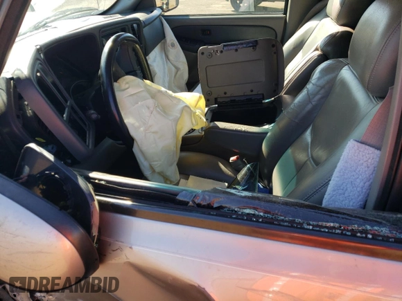 2003 GMC Yukon SLT z VIN 1GKEC13Z03R289219, wystawiony jako Copart lot #45911305 z przebiegiem Nie podano mil oraz Szkoda całkowita • Salvage title. Historia ofert i sprzedaży dostępna na DreamBid. Obrazek 7.
