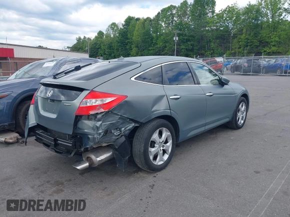 2010 Honda Crosstour EX-L z VIN 5J6TF1H5XAL013687, wystawiony jako IAAI lot #42187755 z przebiegiem 195 579 mil mil oraz . Historia ofert i sprzedaży dostępna na DreamBid. Obrazek 4.