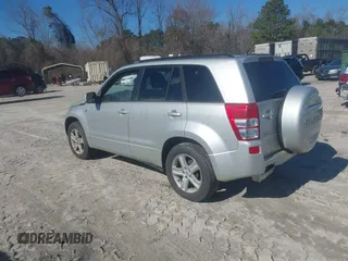 2007 Suzuki Grand Vitara Luxury z VIN JS3TD947074204900, wystawiony jako IAAI lot #41488003 z przebiegiem 187 502 mil mil oraz . Historia ofert i sprzedaży dostępna na DreamBid. Obrazek 3.