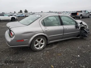 2002 Nissan Maxima GXE с VIN JN1DA31D12T414295, выставлен на аукционе Copart как лот 83090944 с пробегом 175 456 миль миль и Списание • Salvage title. История ставок и продаж доступна на DreamBid. Изображение 3.