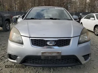2010 Kia Rio LX with VIN KNADH4A38A6627955, listed as a Copart auction lot 43702265 with 138,005 mi miles and Non Repairable. Bid and sale history available at carsss.com. Image 5.