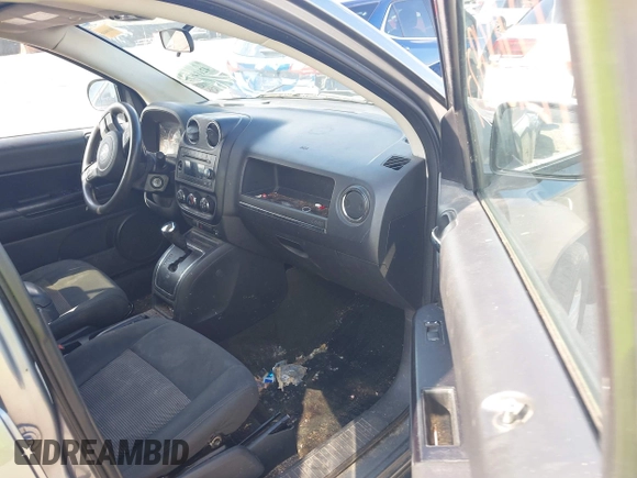 2013 Jeep Compass Sport with VIN 1C4NJCBB2DD174668, listed as a IAAI auction lot 42104977 with 213,123 mi miles. Bid and sale history available at carsss.com. Image 5.