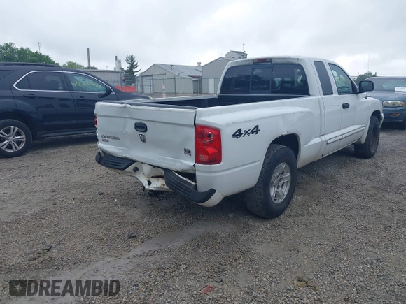 2005 Dodge Dakota SLT with VIN 1D7HW42N75S213191, listed as a IAAI auction lot 42345554 with 152,833 mi miles and . Bid and sale history available at DreamBid. Image 4.