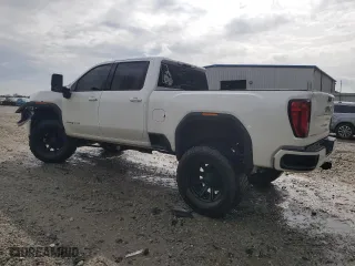 2021 GMC Sierra 2500HD AT4 with VIN 1GT49PEY4MF151246, listed as a Copart auction lot 49975935 with 71,458 mi miles and Salvage Title. Bid and sale history available at carsss.com. Image 2.