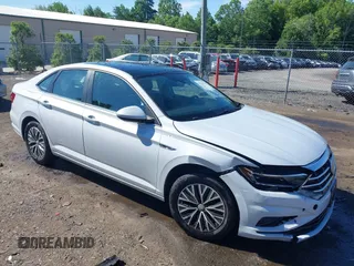 2019 Volkswagen Jetta SEL z VIN 3VWE57BU6KM063035, wystawiony jako IAAI lot #42286649 z przebiegiem 59 914 mil mil oraz . Historia ofert i sprzedaży dostępna na DreamBid. Obrazek 1.