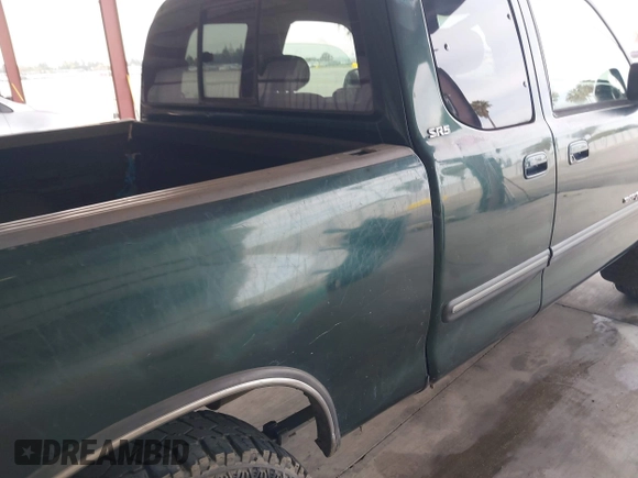 2003 Toyota Tundra SR5 with VIN 5TBRT34133S345035, listed as a IAAI auction lot 41700784 with 372,478 mi miles and . Bid and sale history available at DreamBid. Image 6.
