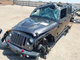 2016 Jeep Wrangler Unlimited Rubicon with VIN 1C4BJWFG7GL274673, listed as a IAAI auction lot 42532134 with 166,661 mi miles and . Bid and sale history available at DreamBid. Image 6.