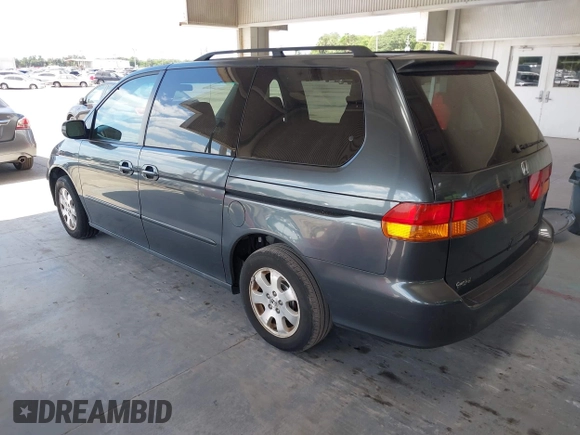2004 Honda Odyssey EX with VIN 5FNRL18624B056333, listed as a IAAI auction lot 42143860 with 165,687 mi miles and . Bid and sale history available at DreamBid. Image 3.