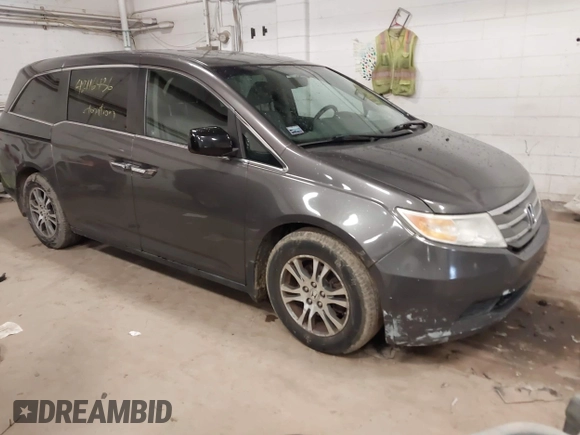 2011 Honda Odyssey EX-L with VIN 5FNRL5H67BB049446, listed as a IAAI auction lot 42116436 with 197,667 mi miles and . Bid and sale history available at carsss.com. Image 1.